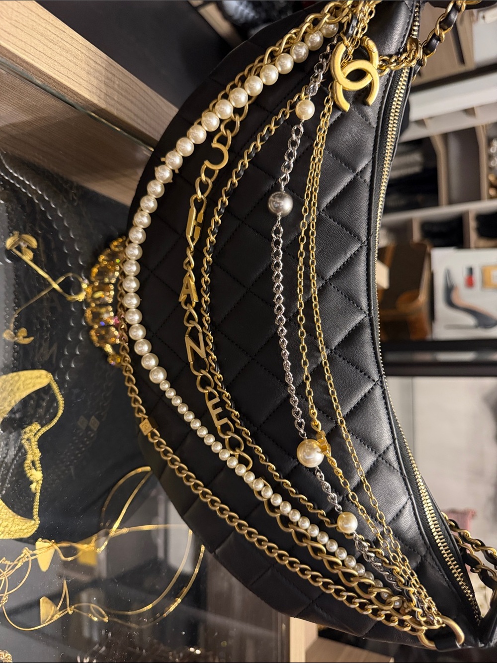 CHANEL Black Quilted Crescent Bag with Gold Chains & Pearl Details